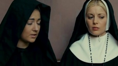 Charlotte Stokely is a horny nun who wants to be seduced by a chick