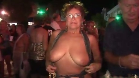 These mature women love to flash in public and they've got big natural tits