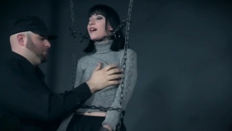 Submissive titless pale hottie Charlotte Sartre gets chained up and masturbated