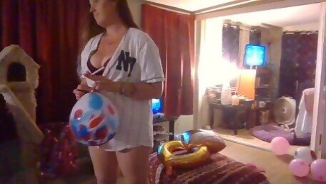 Shy Busty Brunette Popping Balloons For Fans